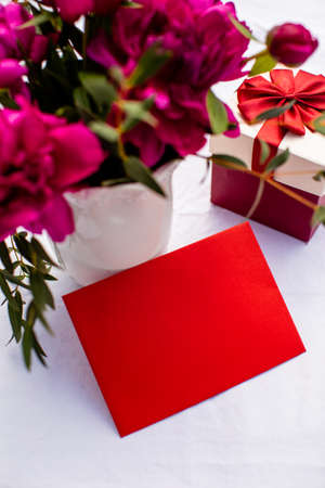 Writing love and passion wishes using flowers and greeting cardの写真素材