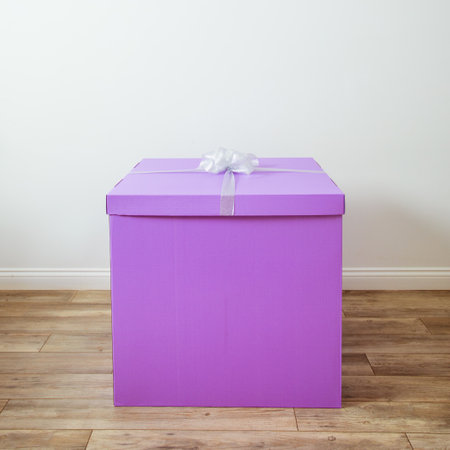 The large romantic gift stands on the floor in the roomの写真素材