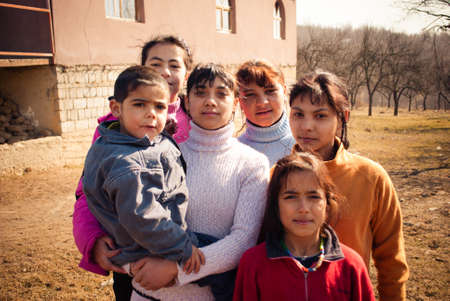 SEREDNIE, UKRAINE - MARCH 09, 2011: having many children is common in Romani society