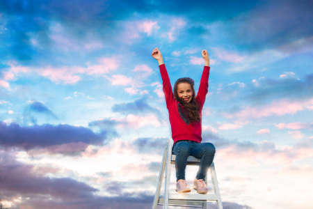 the teen girl is happy to have succeededの写真素材