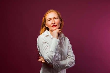 Business portrait of red hair woman with make upの写真素材