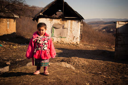 SEREDNIE, UKRAINE - MARCH 09, 2011: surviving in terrible living conditions of Romani ghettoのeditorial素材