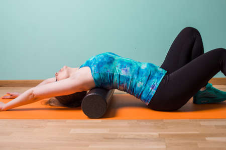 Performing muscle recovery techniques to use at home.の写真素材