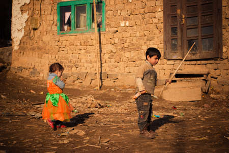 SEREDNIE, UKRAINE - MARCH 09, 2011: Childhood in poverty and misery of abandoned villageのeditorial素材