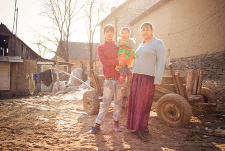 SEREDNIE, UKRAINE - MARCH 09, 2011: early motherhood is a reality in Romani communityのeditorial素材