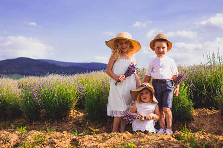 Three adorable kids, brother and two sistersの写真素材