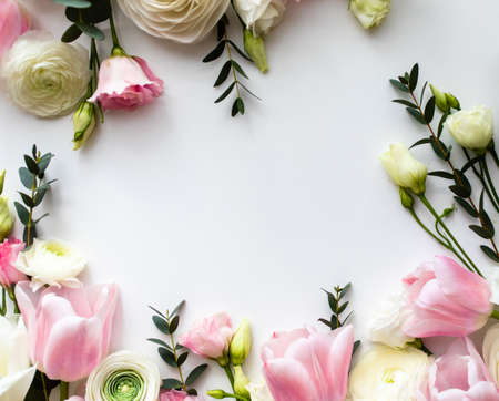 Pink and white flowers border design over the whiteの写真素材