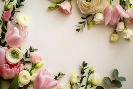 Pink and white flowers border design over the whiteの写真素材
