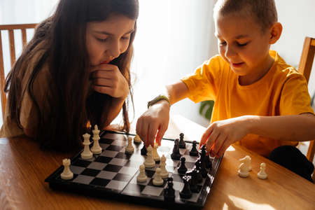 Moments of intensive thinking and anticipation while chess gameの写真素材