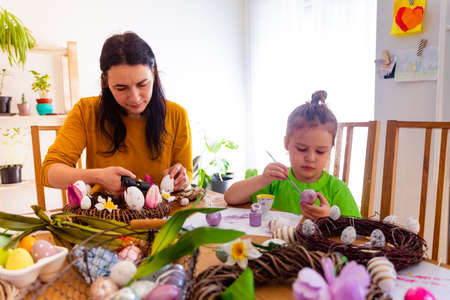 Creative mother organized Easter workshop for her sonの写真素材