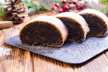 Close up of appetizing roll with lots of poppy seedsの写真素材