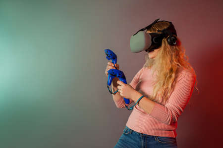 Woman using a gaming gadget for virtual reality
