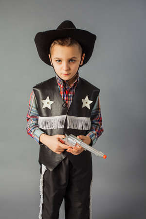 The little boy in a sheriffs costume full lengthの写真素材