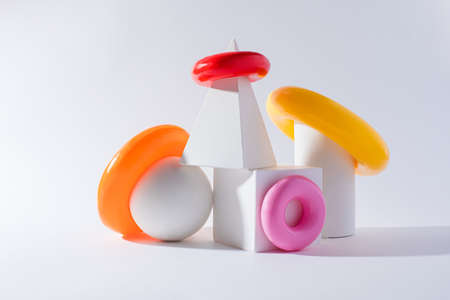 Variety of colorful geometric objects on white background
