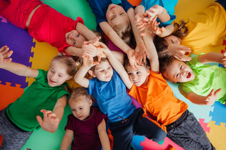 Time to relax after active games at the daycareの写真素材