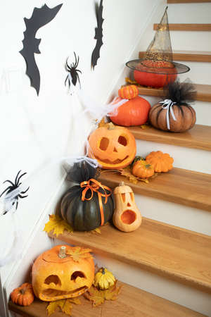 Seasonal autumn decoration on wooden stairs at homeの写真素材