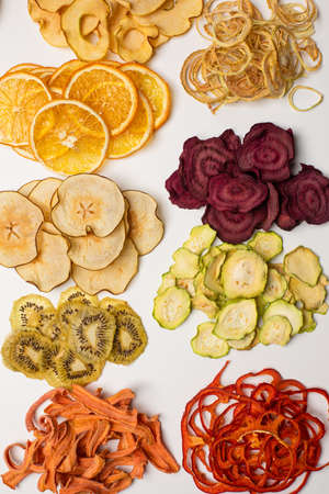 The set of different chips from dried fruitsの写真素材