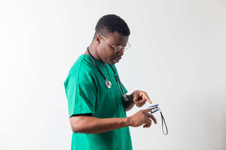 Doctor provides distant consultation on how to use pulse oximeterの写真素材