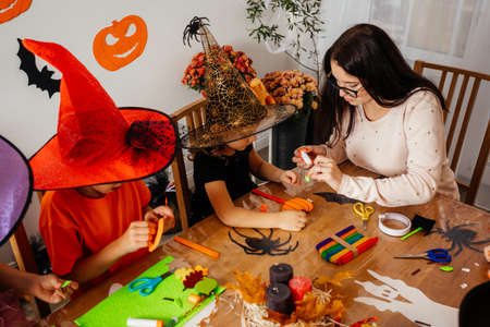 Children during halloween workshop at primary schoolの写真素材
