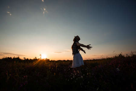 Girl feeling happy being connected with the natureの写真素材
