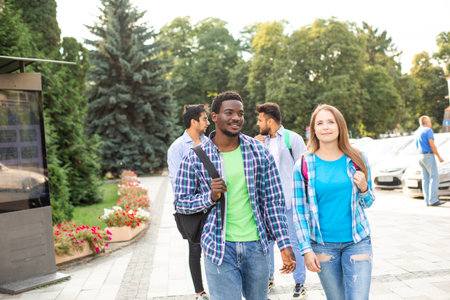 Group of high school students talking and laughingの写真素材