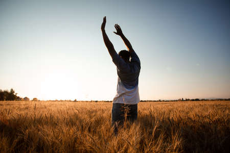 Farmer in the middle of the fieldの写真素材