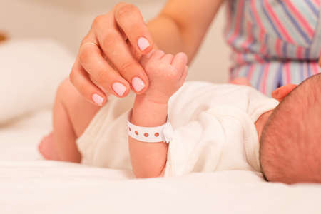 The first communication between mom and newborn babyの写真素材