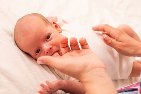 Mom prepare her newborn baby to breastfeedの写真素材