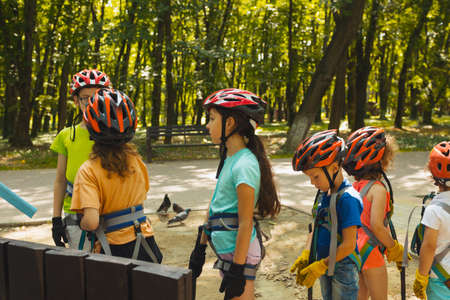 The group of kids in protective gear before start the competitionの写真素材