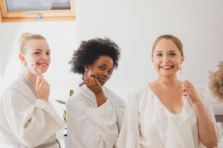 The girlfriends have a great time in the spaの写真素材