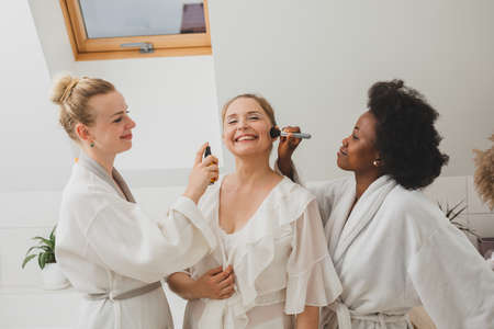 The girlfriends have a great time in the spaの写真素材