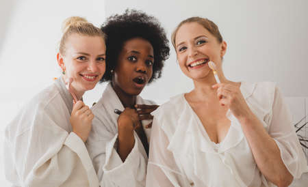 The girlfriends have a great time in the spaの写真素材