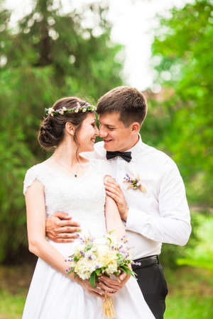 Happy bride and groom after wedding ceremonyの写真素材