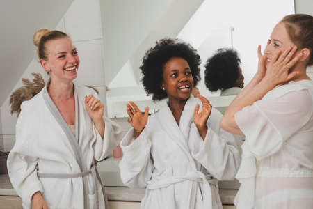 The young women delighted with the spa dayの写真素材