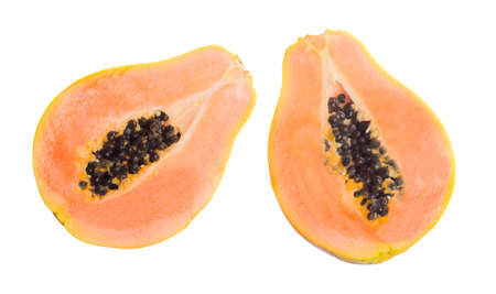 Half cut papaya fruits on white backgroundの写真素材