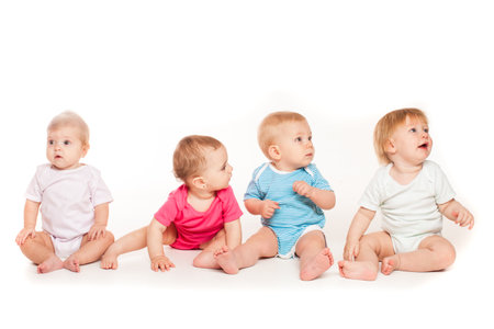 Four babies isolated isolated on white backgroundの写真素材