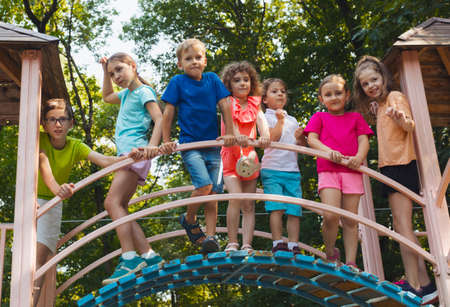 The group of friends spend time together in the playgroundの写真素材