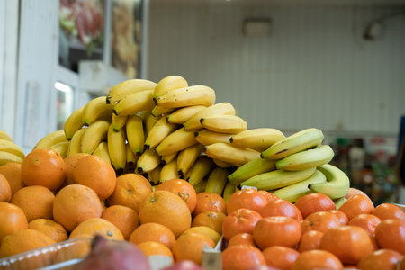 Fresh bananas in plastic boxes on big marketの写真素材