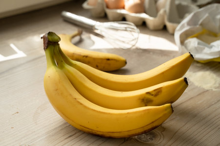 Ingredients for banana pastry, top view on the wooden tableの写真素材