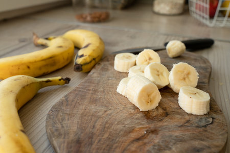 Sliced banana on the table at the kitchenの写真素材