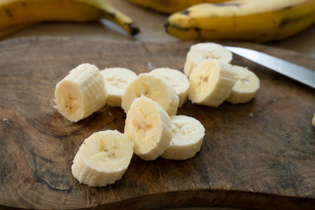 Sliced banana on the table at the kitchenの写真素材