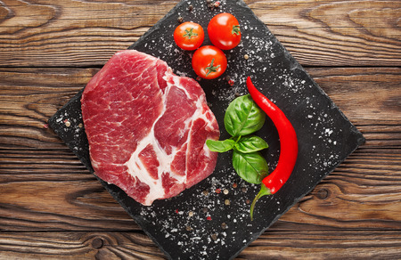 meat on a tree with tomatoes and pepperの写真素材