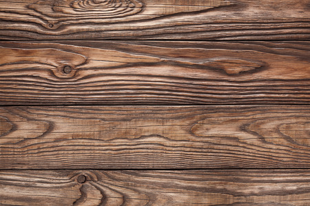 old wooden brown background of four boardsの写真素材