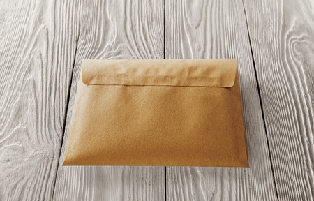 kraft envelopes with letters on old white wooden background. Blanks for the designer. Concepts, ideas for postal services and e-mail.の写真素材