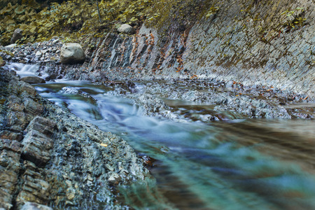 Big rocks in waterfalls of mountains river mountains. Water mountains landscape. Idea for outdoor activities, travel.の写真素材