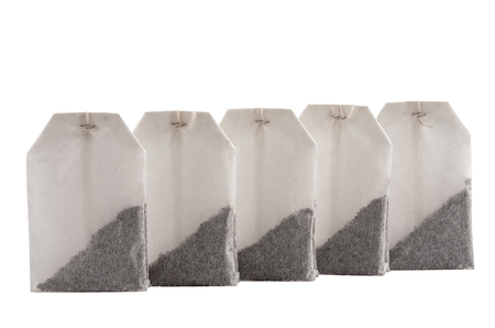 five packs of tea on a white backgroundの写真素材