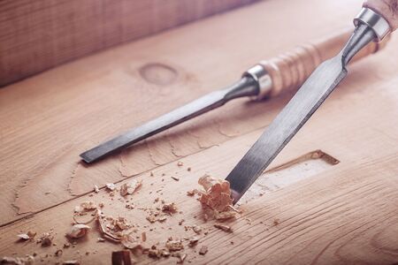 wood chisel plank for the door lock