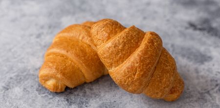 Fresh croissants.Delicious croissants for breakfast with coffee.