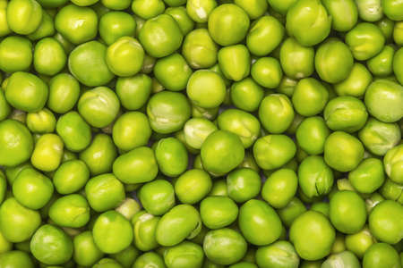 Background from fresh green peas. Green vegetable.