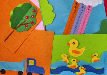 Background from soft felt of different colors. Part of the composition of a children's book from...